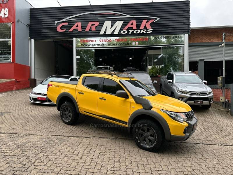 MITSUBISHI - L200 TRITON - 2021/2022 - Amarela - R$ 199.900,00